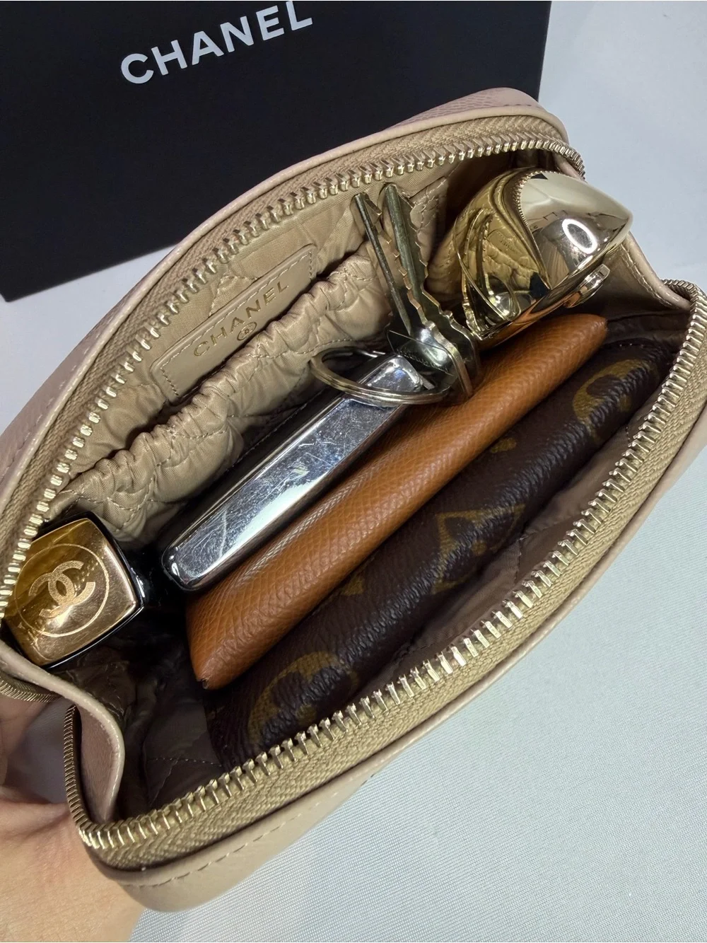 CHANEL Beige Small Curvy Pouch 26C